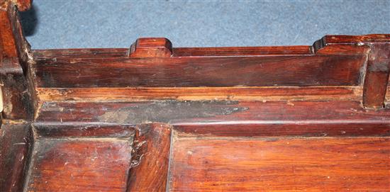 A Chinese huanghuali kang table, 18th/19th century, l. 29.5in., w. 17.25in., h. 12in., repairs